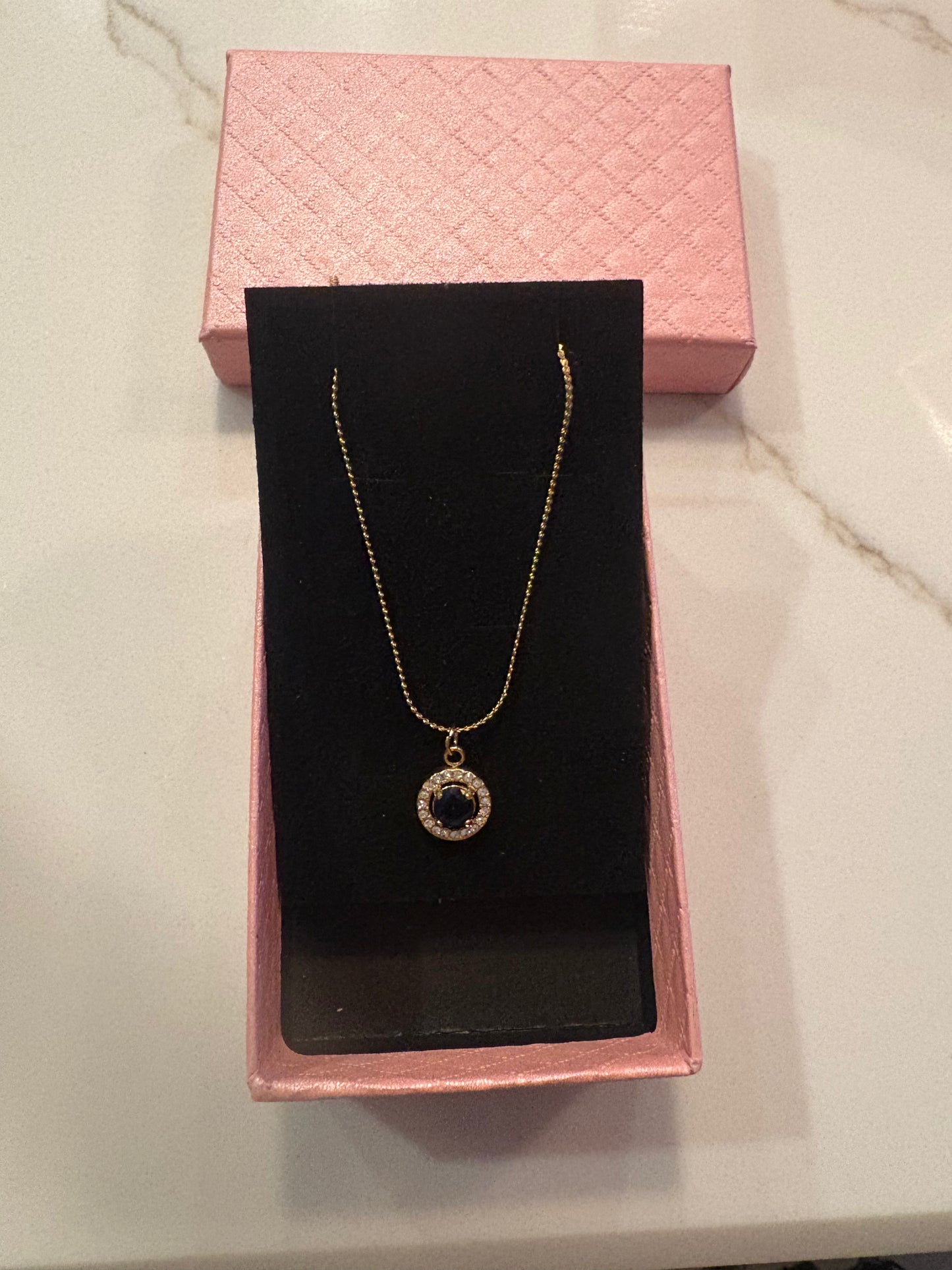 Blue topaz pendant necklace